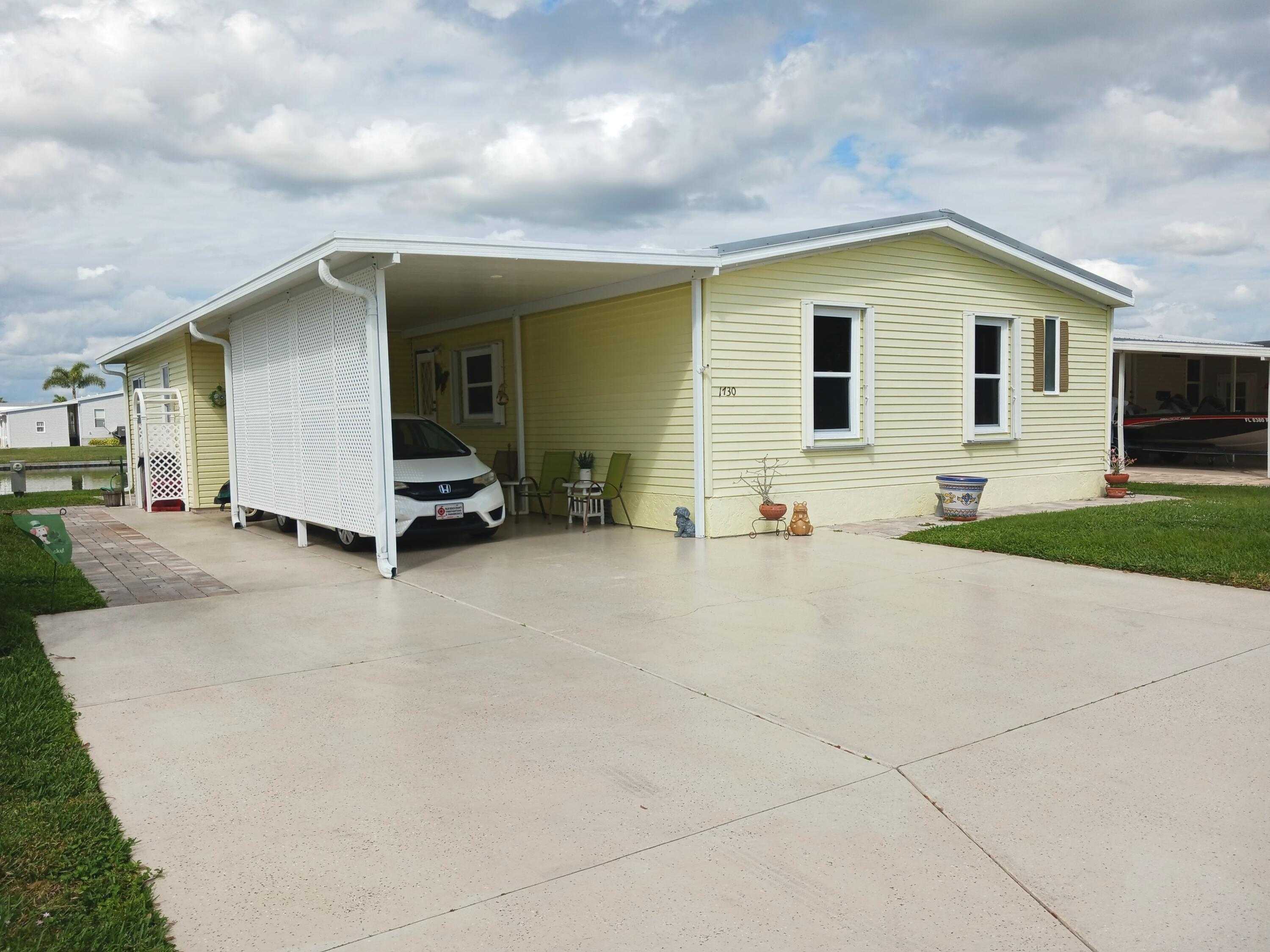 1730 SW 35th Circle. MLS RX10965630. Mixon Real Estate Group