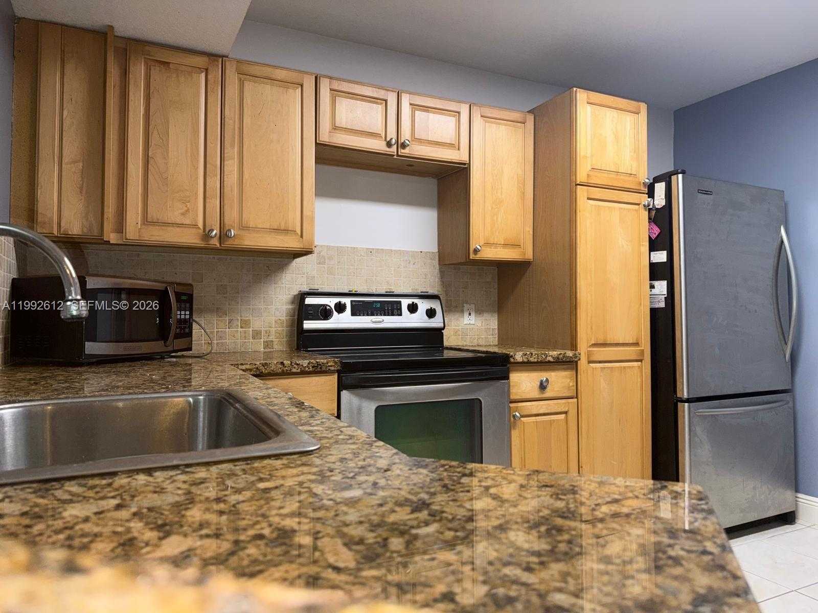 8901 Wiles Rd APT 103 Coral Springs Florida United States, for Sale, residential, Pierre J Denis, Realty 100