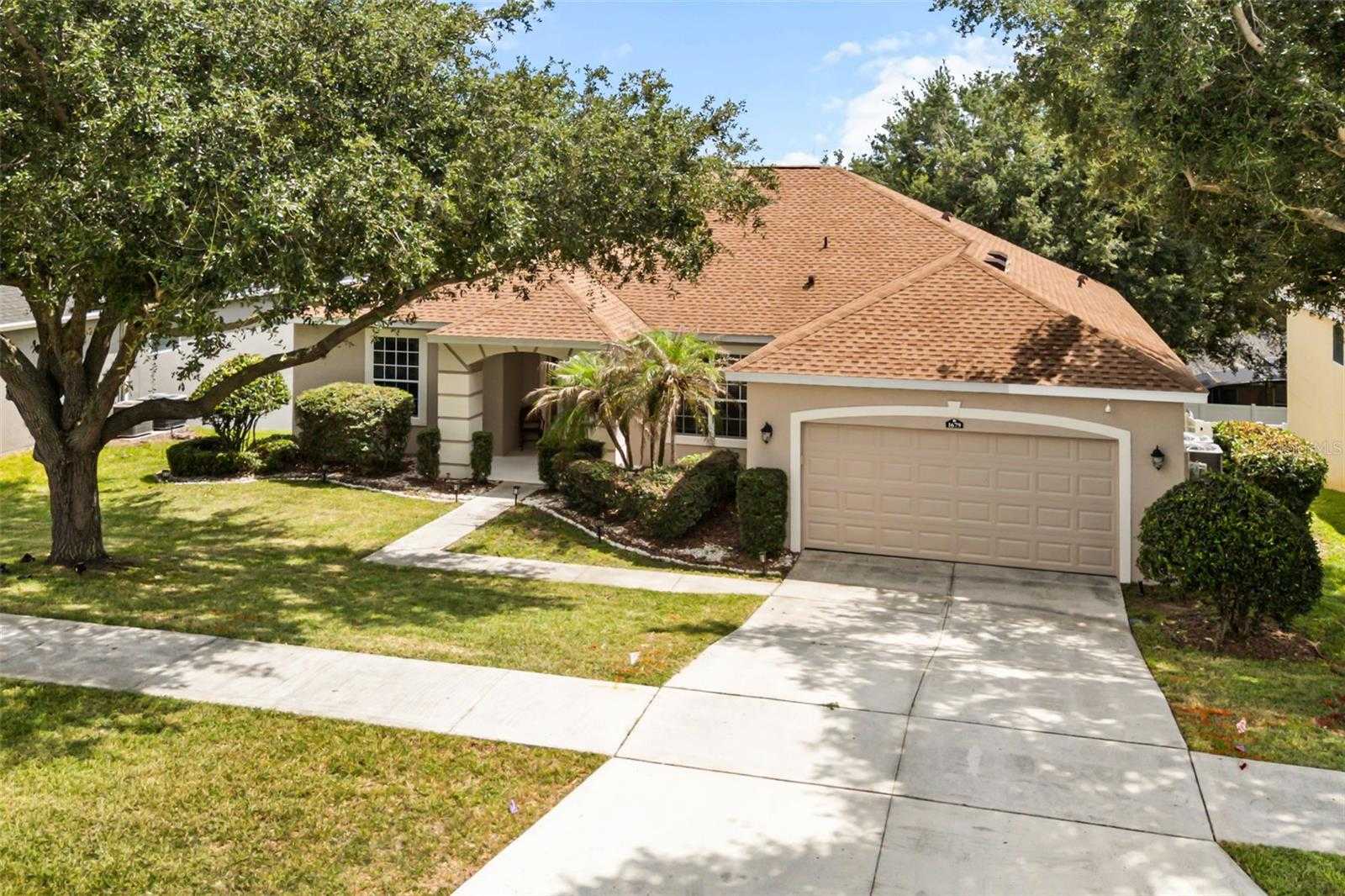 1679 GRANDIFLORA AVENUE Clermont Florida United States, for Sale, residential, Zaira Mejia, Spaces & Styles Group